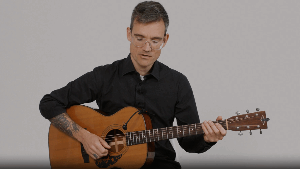 Mark spielt Gitarre